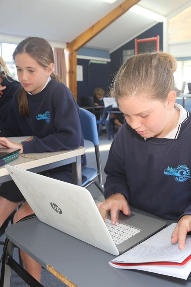 Middle years student on chrome book